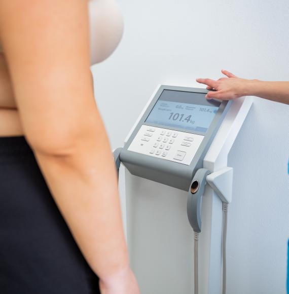 Nurse checks patient's BMI