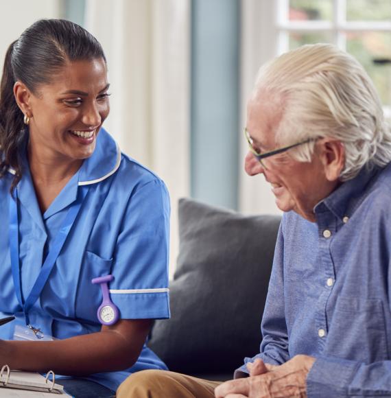 Senior man talking to a nurse