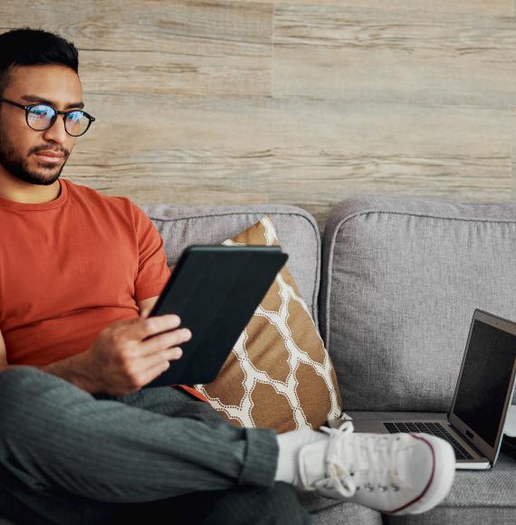Man using an ipad at home
