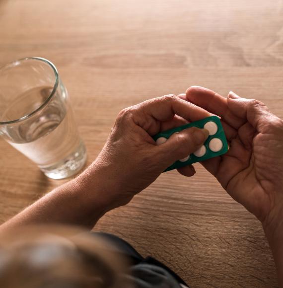 woman taking antibiotics