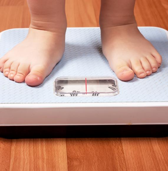 Child on a weighing scale