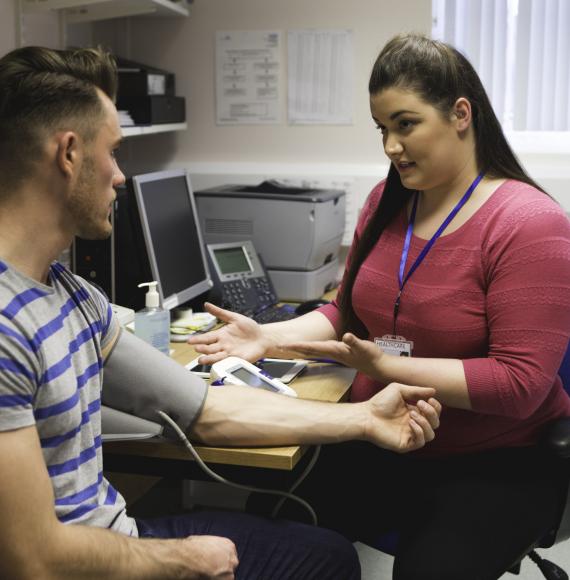 A GP with a patient