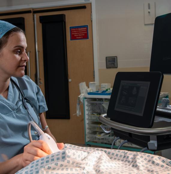 NHS worker scanning a patient