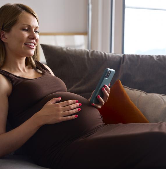 Pregnant Woman With Mobile Phone