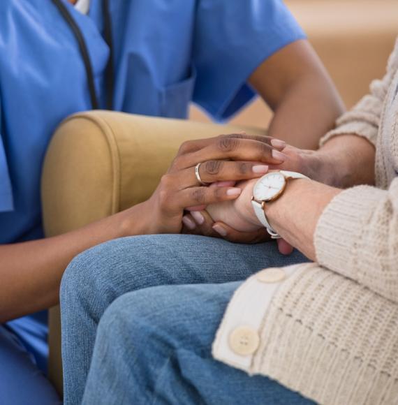 nurse taking care of woman with cancer