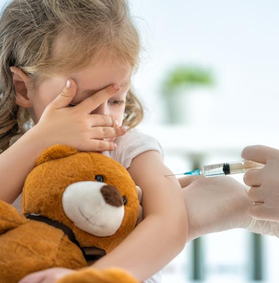 Toddler having an injection