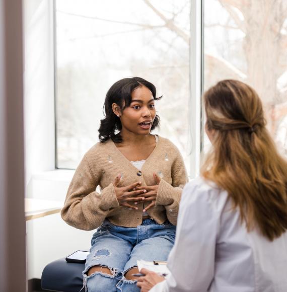 Teenager talking to therapist