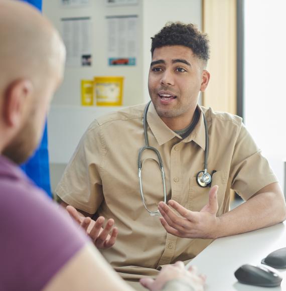 Gp explaining to patient