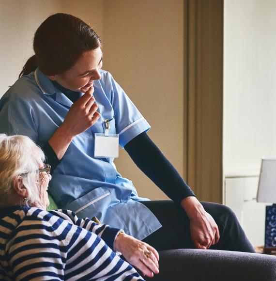 Social care worker with patient