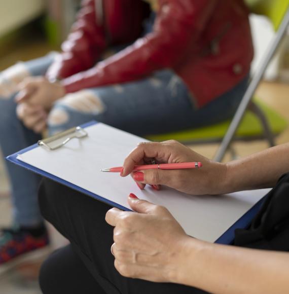 Psychologist meeting with young person