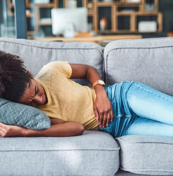 Woman suffering with endometriosis