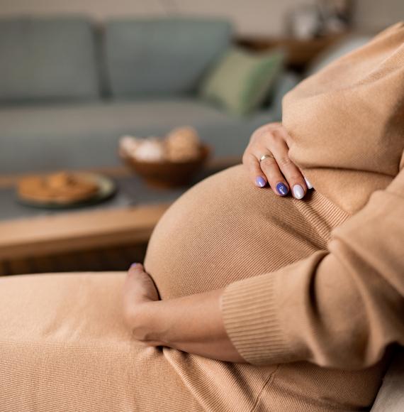 Pregnant woman sat down