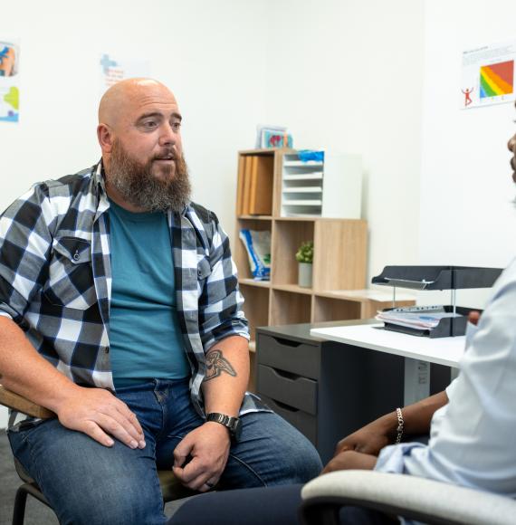 Man with mental health doctor