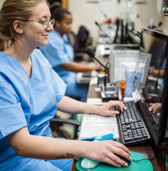 Nurse using a hospital computer