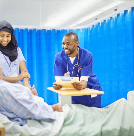 Two NHS staff with a patient