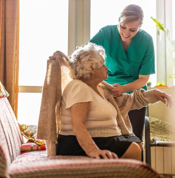 Old woman with care worker