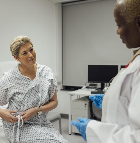 Breast cancer patient with doctor