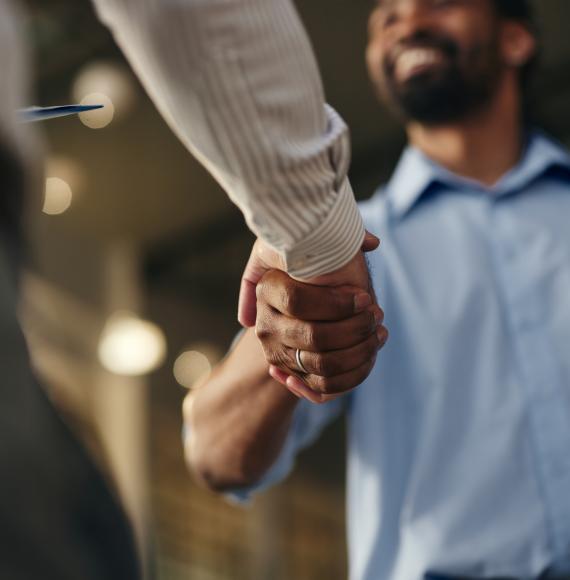 Two people shaking hands