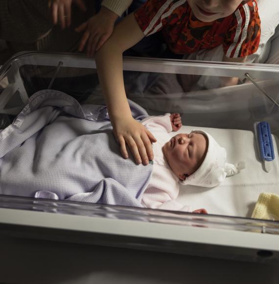 Newborn baby with family