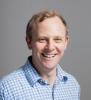 Picture of author, Dr Tom Oakley